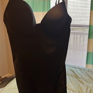 Black corset. Body suit